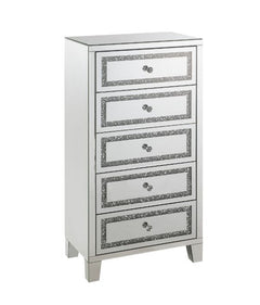 The Noor Cabinet will add a contemporary touch to any room in your home. With its clean lines and faux diamond inlay, this brilliant cabinet showcases a distinctive style for an intriguing look. The cabinet features five storage drawers with safety stop a