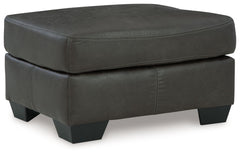 If you love the cool look of leather but long for the warm feel of fabric, you-'ll find this ottoman fits the bill beautifully. Enhancing its handsome profile and generous scale: a textural, multi-tonal upholstery thatâ€™s loaded with character and intere