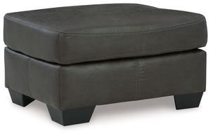 If you love the cool look of leather but long for the warm feel of fabric, you-'ll find this ottoman fits the bill beautifully. Enhancing its handsome profile and generous scale: a textural, multi-tonal upholstery thatâ€™s loaded with character and intere