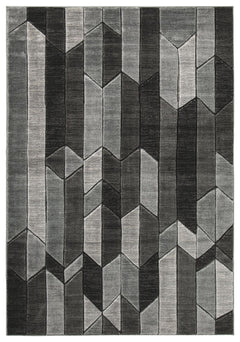 Inspired by the Cubist art movement, this area rug adds a brilliant contemporary touch to a space. Its bold, multidimensional aestheticâ€”enhanced with hand-carved detailsâ€”is tempered with an understated palette in easy-to-love earth tones.<br/><br/><b>