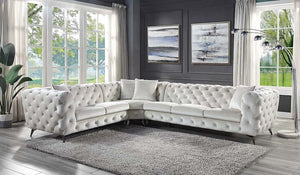 Whether you have a large family or simply enjoy entertaining regularly, this Atronia sectional is the perfect pick for living rooms that see a lot of people on daily basis. Built on a sturdy wooden frame, this modern sectional is wrapped in beige fabric u