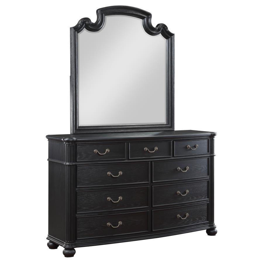 Reflect beauty and light in your sanctuary with this elegant dresser mirror. Framed in the same dark, rich tones as the set, it complements the dresser perfectly, creating a space where getting ready is done in style. The mirror invites light and depth in