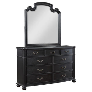 Reflect beauty and light in your sanctuary with this elegant dresser mirror. Framed in the same dark, rich tones as the set, it complements the dresser perfectly, creating a space where getting ready is done in style. The mirror invites light and depth in