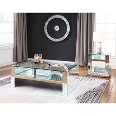 The Nysa Coffee Table will add a contemporary touch to any room in your home. With its clean lines, this brilliant rectangular occasional table showcases a distinctive style for an intriguing look. The table features a fully mirrored sled base with an exq