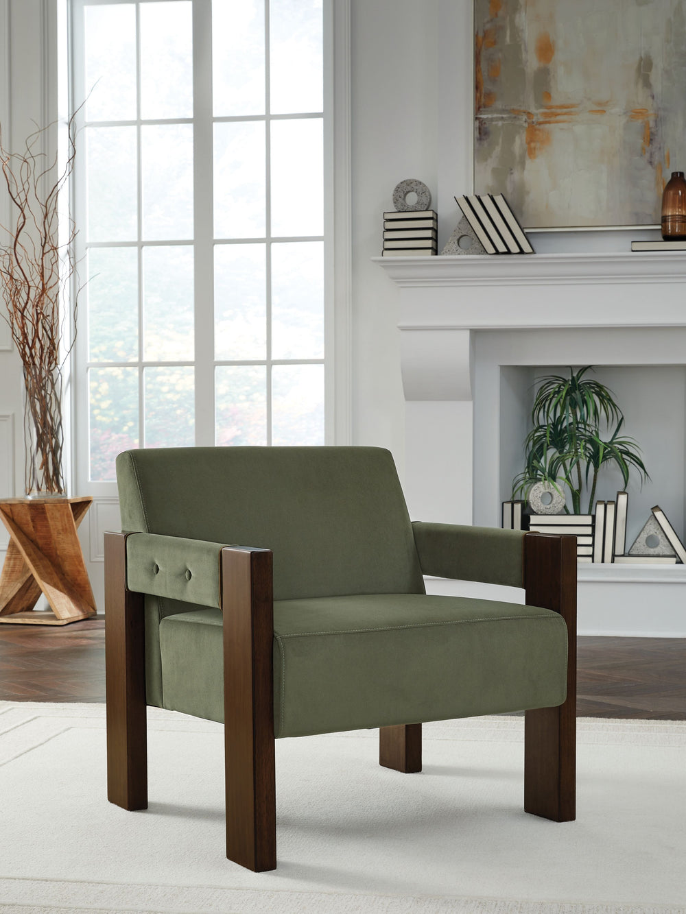 Get your modern sophistication on with this chic accent chair. Its rich olive green velvet upholstery is both luxurious and inviting, while an espresso-finished wood frame provides a warm, grounding element. The chair-'s clean lines and minimalist design 