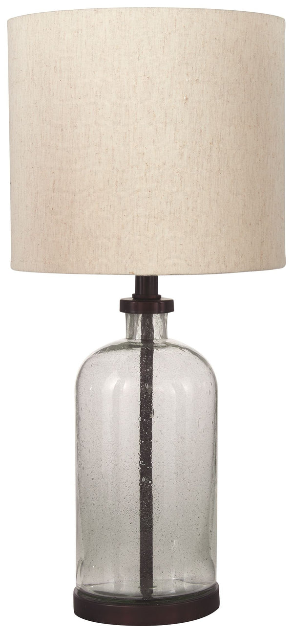 At home in urban industrial or modern farmhouse settings, this seeded glass lamp illuminates a cool vibe in any space. The bronze-tone finish gives this piece a vintage slant while the drum shade provides the clean, modern lines you want.<br><br><b>Additi