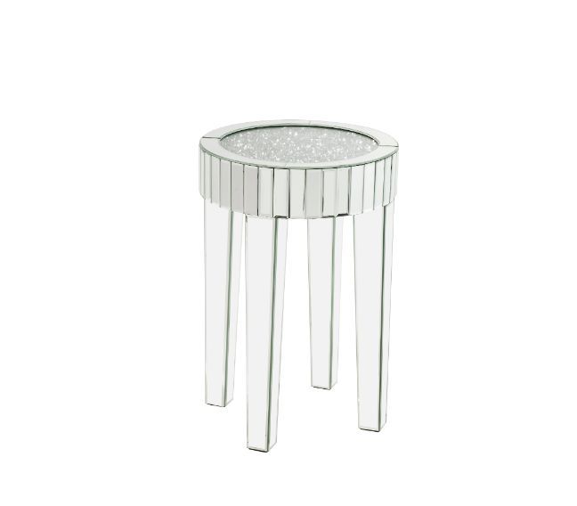 This piece strikes a sleek, clean-lined silhouette accented by faux diamonds and mirrored finish. Adding depth and dimension to your room while upping the wow factor in your home. This Ornat End Table is ideal for displaying your precious family photos an