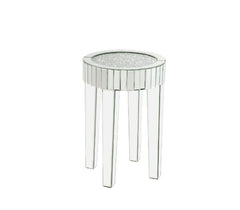 This piece strikes a sleek, clean-lined silhouette accented by faux diamonds and mirrored finish. Adding depth and dimension to your room while upping the wow factor in your home. This Ornat End Table is ideal for displaying your precious family photos an