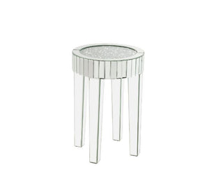 This piece strikes a sleek, clean-lined silhouette accented by faux diamonds and mirrored finish. Adding depth and dimension to your room while upping the wow factor in your home. This Ornat End Table is ideal for displaying your precious family photos an
