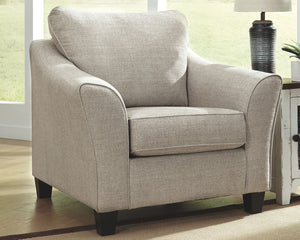  this accent chair impresses with a tailored silhouette. Styled in a warm neutral color perfect in any contemporary home