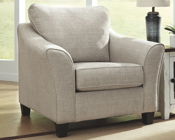  this accent chair impresses with a tailored silhouette. Styled in a warm neutral color perfect in any contemporary home