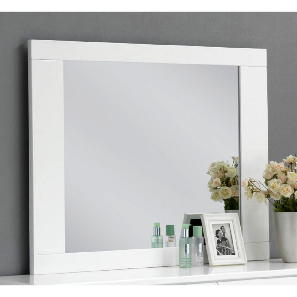 A simply designed Lorimar mirror in white finish with straight angular lines will become the focal point in your bedroom. The contemporary details and clean lines increase modern feel of this contemporary mirror with beveled edge frame. Create a modern an