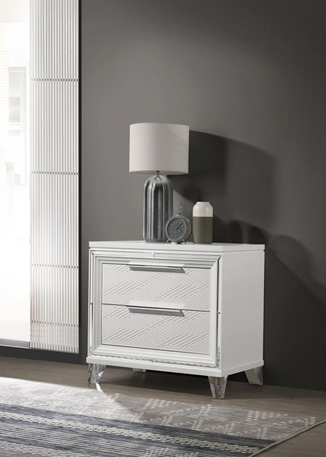 Complete your bedroom ensemble with this elegant 2-drawer nightstand, designed with a modern Italian aesthetic. The white finish, accented with mirror framing and polished chrome metal hardware, creates a striking look. Featuring picture framed recessed p