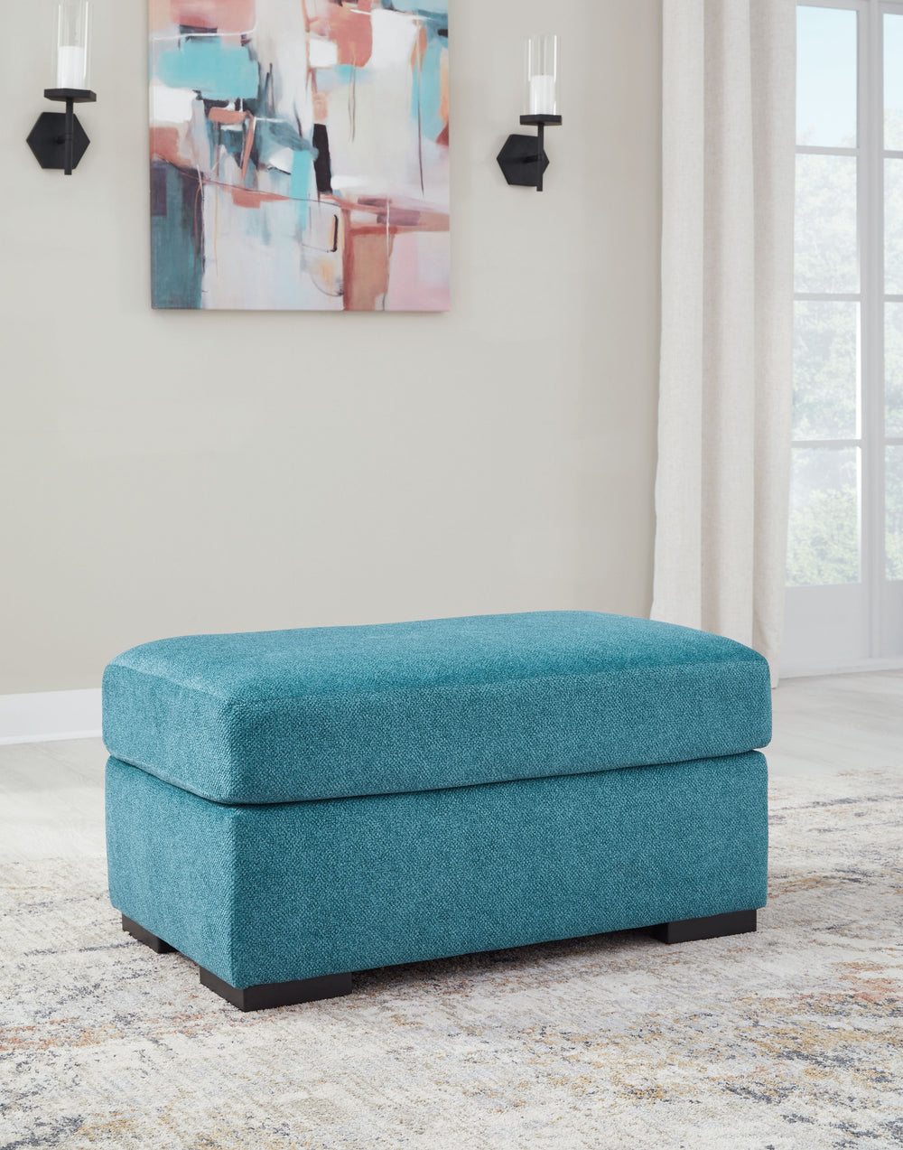 You want your home to reflect your modern, trendy eye for design. This ottoman is here to help. Bold, bright and beautiful, it adds a fashion-forward pop of color to your living room. Velvet-like upholstery keeps comfort at top of mind, whether you-'re lo