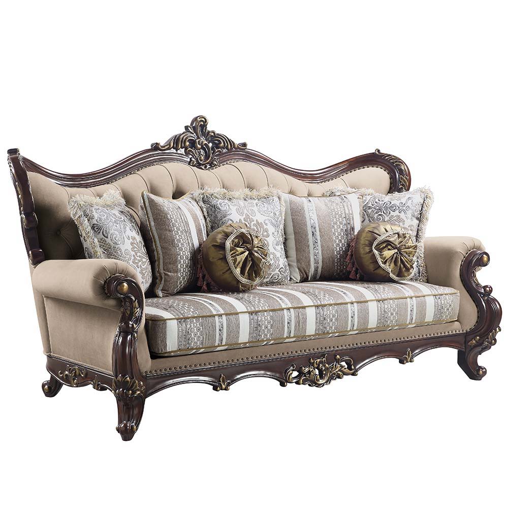 Embrace the essence of lavish living into your home with this Ragnar sofa. Highlighting detailed carvings that naturally follow with the elegant curves of the rolled arms that make a transition to the wood-trimmed arched backrest which features a camel hu