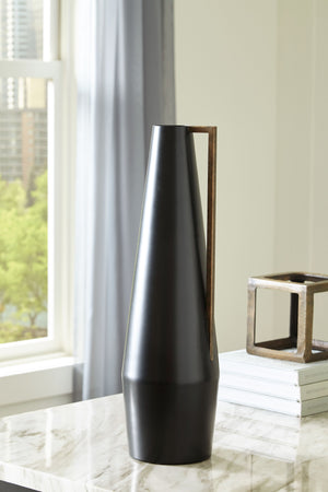  it-'s finished in a sleek black. An angular goldtone accent adds a dash of glam