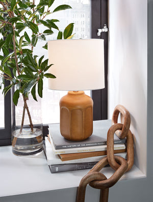  please. What an illuminating take on minimalist-inspired style. This ceramic lamp sports a textural body with a glazed finish