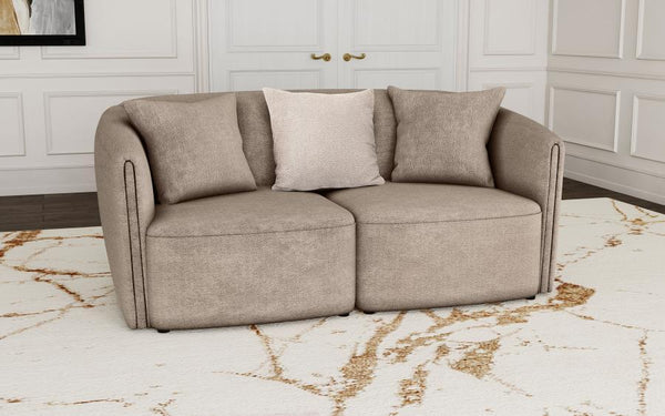  while tailored upholstery offers curated appeal. The loveseat is upholstered in chenille with a neutral