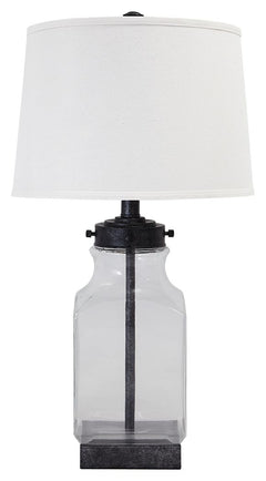 New turn on an old classic. This delightfully styled table lamp is brimming with vintage-inspired charm. Elements include antiqued silvertone metal paired with a smoky glass base and a modified drum shade for a crisp, clean touch.<br><br><b>Additional Dim
