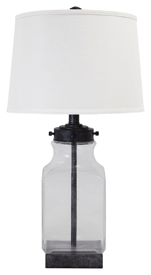 New turn on an old classic. This delightfully styled table lamp is brimming with vintage-inspired charm. Elements include antiqued silvertone metal paired with a smoky glass base and a modified drum shade for a crisp, clean touch.<br><br><b>Additional Dim