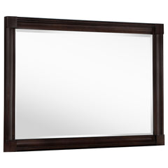 This dresser mirror enhances any room with its simple yet elegant design. The clean lines and dark oak frame bring a sense of warmth and sophistication, perfectly complementing traditional and transitional decor styles. The generous size of the mirror ref