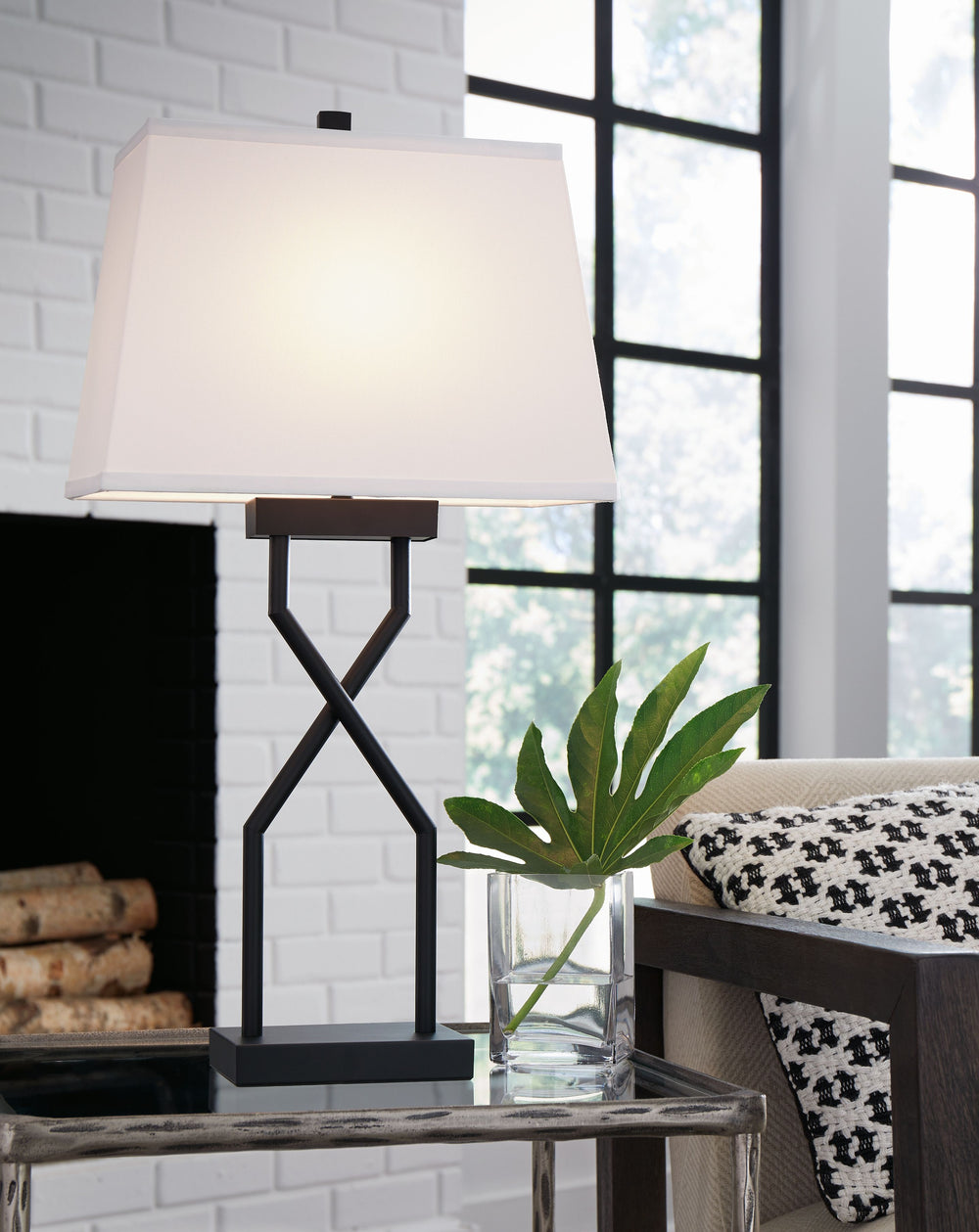 Craft a contemporary hideaway with a focus on must-have function. This lamp puts a twist on standard stylings, lending subtle structure to your decor. While it shines a light on daily to-dos, it simultaneously keeps you connected digitally with a sleek US
