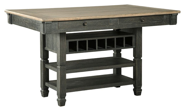Invite your family into the heart of your home with this rectangular counter height dining room table. A beautifully textured black finish and a timeworn planked oak top create a unique two-tone contrast. The base provides plenty of storage for wine bottl