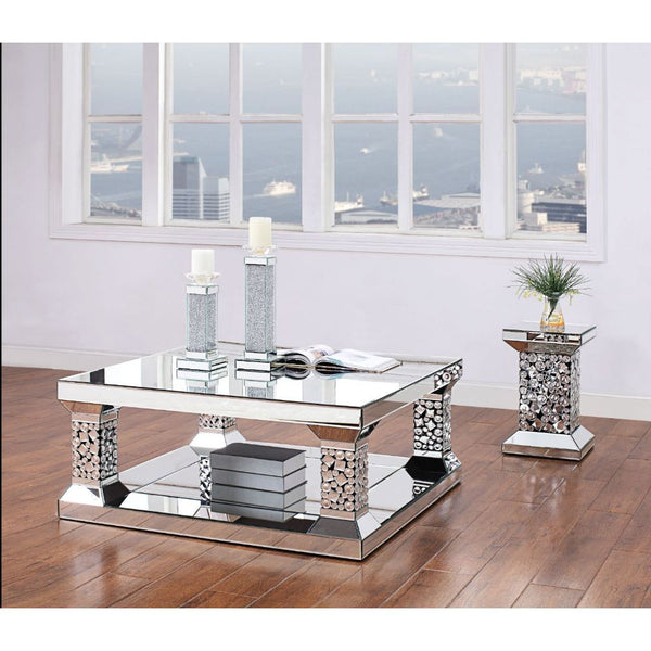 The Kachina Coffee Table will add a contemporary touch to any room in your home. With its clean lines, this brilliant rectangular occasional table showcases a distinctive style for an intriguing look. The table features a fully mirrored beveled frame with