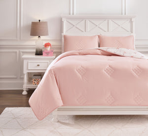  the comforter reverses to a crisp and fresh arrow design in pink