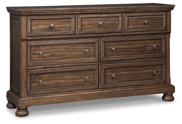 A fresh, new take on traditional style. This dresser meets todayâ€™s design tastes with beauty and grace. Its tobacco brown finish allows the natural grain of the acacia veneers to show through in an organic way. Aged brass-tone knobs dress the fronts of 