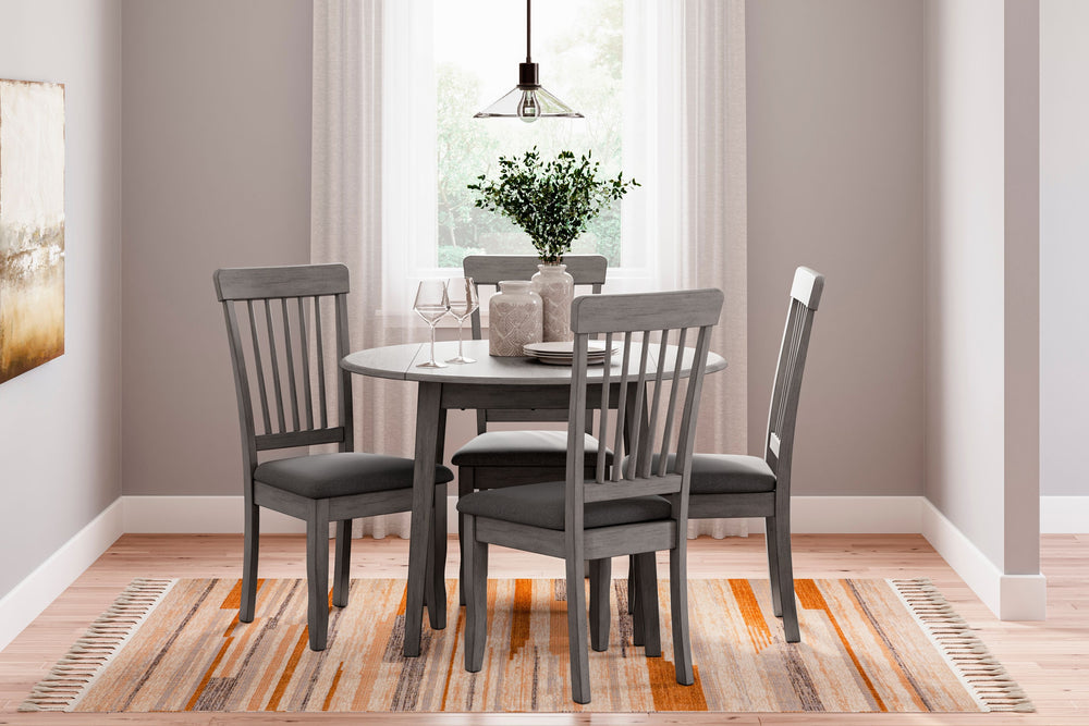 Serve up casual elegance with this dining room set. Its approachable character ushers a relaxed feel into kitchen nooks and small dining rooms. Two drop leaves provide just enough table space to accommodate the drop-in guest and the chair design details l