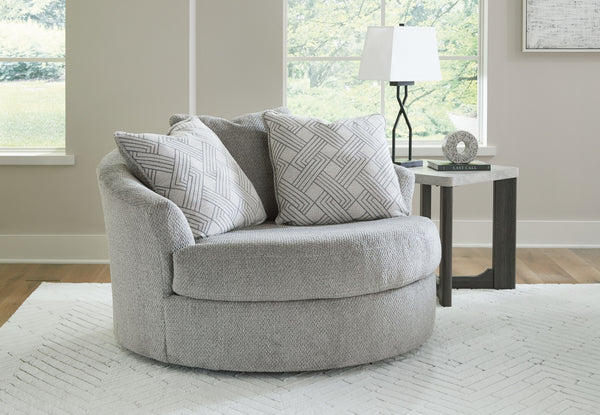  itâ€™s easy to switch from watching TV to talking to guests. A trendy gray hu