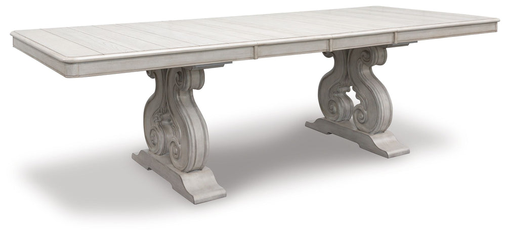 Add a touch of romance to your home with this dining extension table. The painted finish and shapely silhouette are all about easy elegance. Turning the focus on the double sculptural pedestal base, this graceful table adds a dash of upscale luxury to the