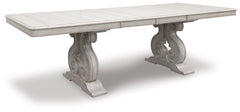 Add a touch of romance to your home with this dining extension table. The painted finish and shapely silhouette are all about easy elegance. Turning the focus on the double sculptural pedestal base, this graceful table adds a dash of upscale luxury to the