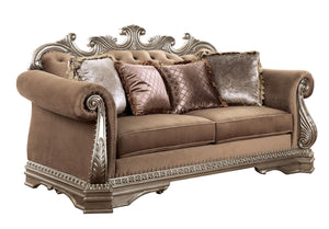 The Northville loveseat is exclusively designed and filled with romantic spirit. This beautiful velvet upholstered loveseat features carved legs, apron, and trim, decorated with raised and scrolled floral motifs in an antique silver finish. This sophistic