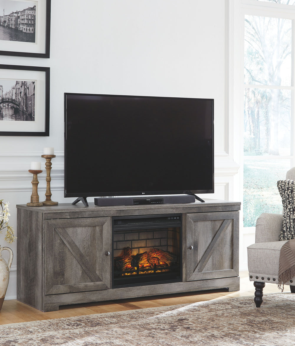 This TV stand with fireplace insert is sure to win your heart with its daring designer take on modern rustic. The standâ€™s crisp, clean and minimalist-chic profile is enriched with a striking replicated oak grain with thick plank styling and a weathered 