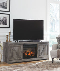 This TV stand with fireplace insert is sure to win your heart with its daring designer take on modern rustic. The standâ€™s crisp, clean and minimalist-chic profile is enriched with a striking replicated oak grain with thick plank styling and a weathered 