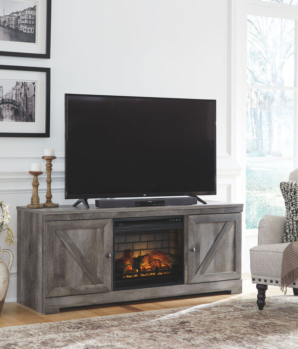 This TV stand with fireplace insert is sure to win your heart with its daring designer take on modern rustic. The standâ€™s crisp, clean and minimalist-chic profile is enriched with a striking replicated oak grain with thick plank styling and a weathered 