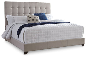 Serenity now. This queen upholstered bed is sure to awaken a love for modern platform styling with a softer side. Plush to the touch and so easy on the eyes, a pale beige fabric hugs the bedâ€”from the chic headboard with square button tufting, to the low