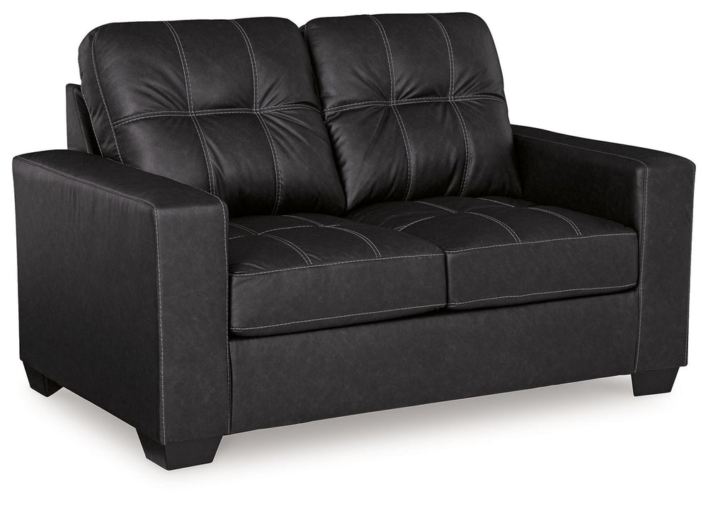 Everyday comfort meets versatile style in this loveseat. The handsome hue of the goes-with-anything faux leather takes away the stress of styling, expertly pairing with your existing aesthetic. From kicking back on the weekends to relaxing post-work, livi