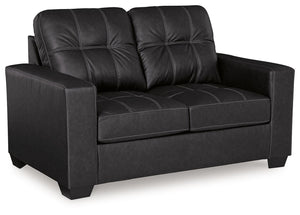 Everyday comfort meets versatile style in this loveseat. The handsome hue of the goes-with-anything faux leather takes away the stress of styling, expertly pairing with your existing aesthetic. From kicking back on the weekends to relaxing post-work, livi
