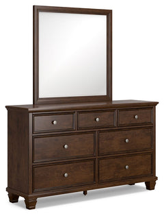 The casual design of this dresser and mirror introduces a time-honored look to your restful retreat. Spacious enough to hold all your essentials, this beautifully crafted piece is built to last with distinctive framing that gives the drawer fronts brillia