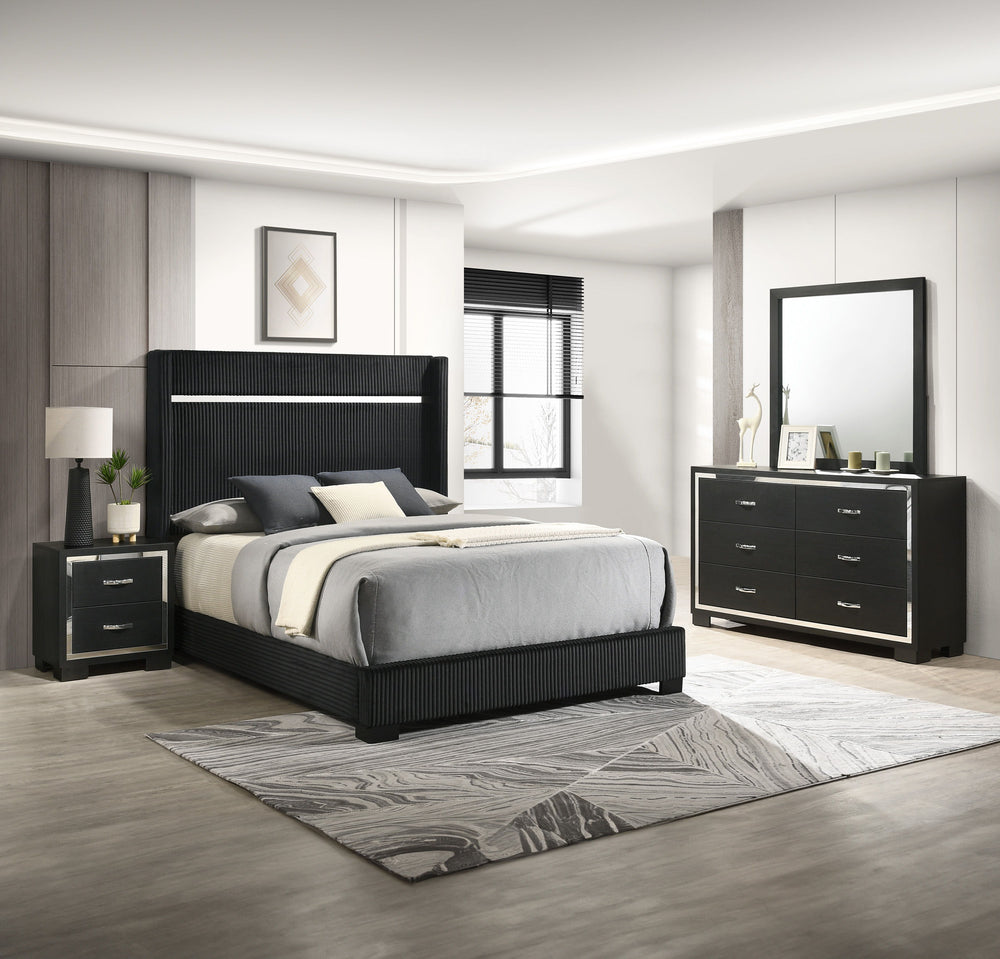 This bedroom collection strikes a balance between bold and classic styles. It features a striking bed with a high, channel tufted headboard that commands attention. The accompanying case goods, including a dresser with a mirror, chest, and nightstand, are
