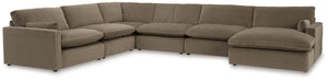 Find yourself inspired by elevated yet functional style. This sectional with chaise balances ultra-soft seating with a clean-cut appearance. Its modular design caters to your needs, whether youâ€™re making space for guests or setting up a cozy family movi