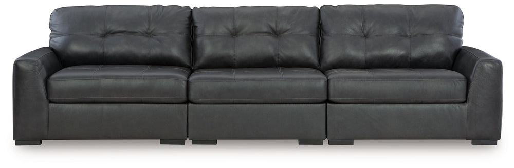 Discover lasting luxury with this sectional sofa. You-'ll experience the perfect blend of comfort and stylish design with its combination of leather and faux leather. Featuring tufted detailing and low-profile legs, this must-have loveseat ensures both co
