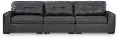 Discover lasting luxury with this sectional sofa. You-'ll experience the perfect blend of comfort and stylish design with its combination of leather and faux leather. Featuring tufted detailing and low-profile legs, this must-have loveseat ensures both co