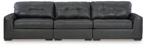 Discover lasting luxury with this sectional sofa. You-'ll experience the perfect blend of comfort and stylish design with its combination of leather and faux leather. Featuring tufted detailing and low-profile legs, this must-have loveseat ensures both co