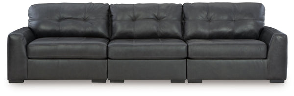 Discover lasting luxury with this sectional sofa. You-'ll experience the perfect blend of comfort and stylish design with its combination of leather and faux leather. Featuring tufted detailing and low-profile legs, this must-have loveseat ensures both co