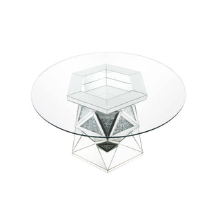 The Noralie dining set is the perfect centerpiece for any social gathering. A clear glass top keeps the focus on the sparkling faux diamond inlay of the pedestal table base. Matching side chairs feature curved cabriole legs in a stainless steel finish tha