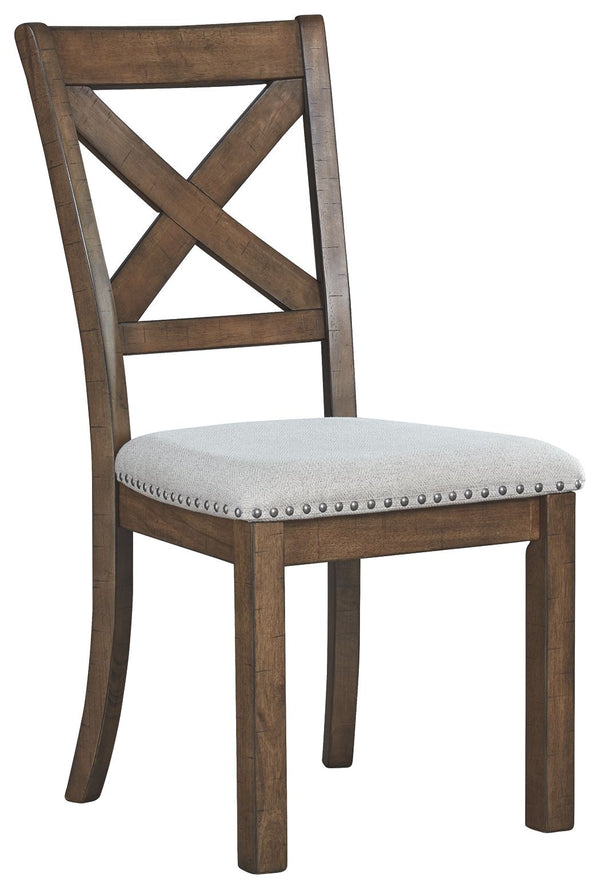 This upholstered dining chair elevates the art of casual rustic style. With a distressed nutmeg finish, antiqued nailhead trim and textured polyester fabric, this upholstered dining chair with classic X back styling entices with warmth and earthy elegance